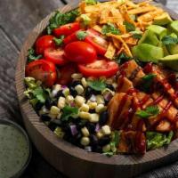Southwest Bbq Chicken · Kneaders greens, grilled BBQ chicken, fresh cilantro, tomatoes, black beans, avocado, red on...