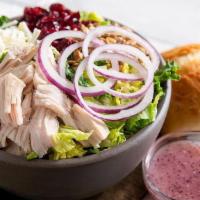 Turkey Cranberry Sunflower Salad · Kneaders greens, slow-roasted, hand-pulled turkey, mozzarella cheese, dried cranberries, sun...