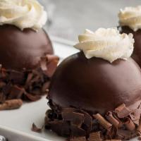 Chocolate Mousse Dome · Chocolate cake, with a mound of imported Swiss chocolate mousse, covered with imported choco...
