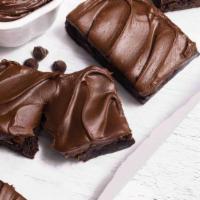 Double Fudge Brownie · Brownies with chocolate chips melted inside topped with a chocolate fudge icing.