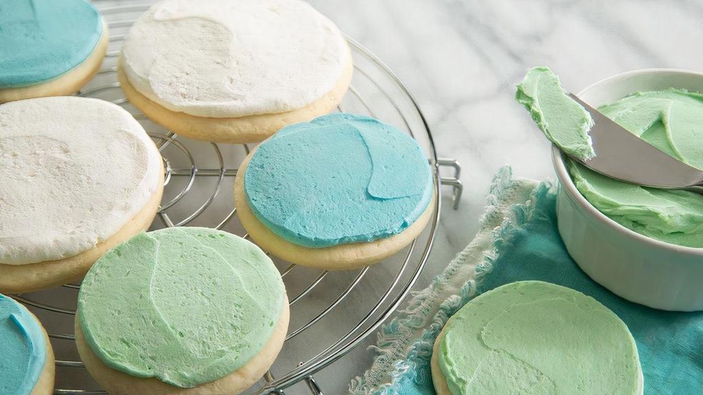 Large Sugar Cookie · The perfect soft crumbly delicious cookie. These sugar cookies are made out of a lemon sugar cookie dough then frosted and hand-decorated with homemade buttercream icing.