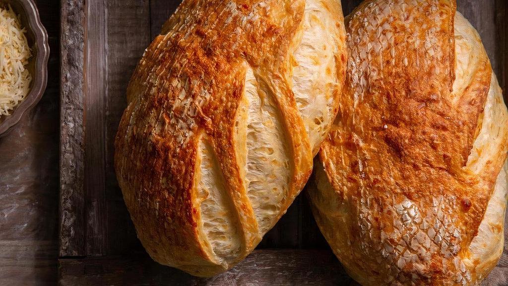 Asiago Cheese · The perfect blend of asiago and parmesan cheeses baked in the bread.