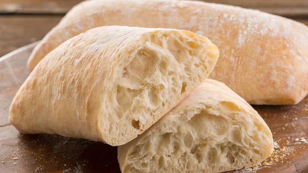 Ciabatta · A favorite at the bakery; the thin crust and moist, open grain interior create the perfect dipping bread.