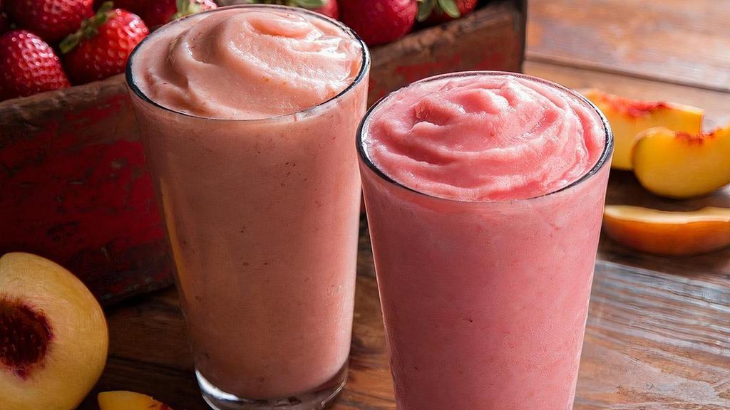 Strawberry Tsunami Smoothie · Cranberry juice, pineapple sherbet, peaches, strawberries