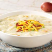 Loaded Baked Potato Soup · Hearty cream soup with potatoes and bacon bits. Topped with cheddar cheese, bacon bits and g...