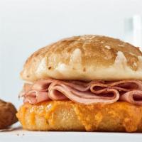 Grilled Cheese Sandwich · 3 cheeses | signature sauce | sourdough bun. choice to add: ham | smoked turkey | chicken
