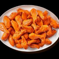 Traditional Wings - 100 · Authentic buffalo, new york-style chicken wings, handspun your choice of sauces or dry seaso...