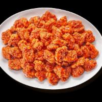 Boneless Wings - 50 · Juicy all-white chicken, lightly breaded, handspun your choice of sauces or dry seasonings, ...