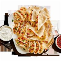 Southwest Platter  · 6 street tacos, 2 chicken quesadillas, house-made pico de gallo, crema, serves 6-8.