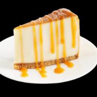 New York-Style Cheesecake  · Classic New York-style cheesecake, caramel sauce, serves 16.