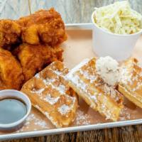 Chicken And Waffles · 3 tenders, Belgian waffle, powdered sugar, crack butter, maple syrup, choice of one side and...