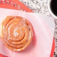 Cinnamon Roll · A large pastry rolled with cinnamon and covered in our famous glaze. A classic! Each piece 3...