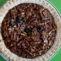 Mini Bourbon Chocolate Pecan Pie · This delicious pecan pie has just the right amount of bourbon and chocolate inside and is ab...