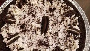 Full-Size Oreo · We start with an Oreo cookie crust, then the cream filling is a mix of cream cheese and home...
