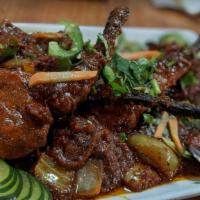 Zaika’S Lamb Chops · Gluten-free. Lamb chops cooked in tandoor with herbs, yogurt, spices, and finished with home...