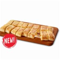 Stuffed Howie Bread · 16 bread sticks stuffed with mozzarella, cheddar, & topped with garlic herb seasoning & parm...