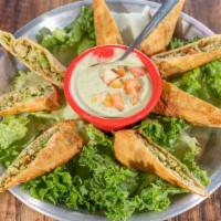 Chicken Avocado Egg Rolls · Our Hand-made Egg rolls filled with avacodo, chicken , cilantro and spices. Served with Our ...