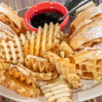 Chicken & Waffle Sandwich · A Southern favorite, fried chicken breast served between two homemade waffles with maple syr...