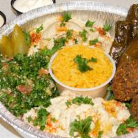 Vegetarian Plate · Served with rice, tabouleh salad, hummus, baba ganoush, domas, falafel, pita bread and tzatz...