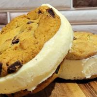 Vanilla Ice Cream Cookie Sandwich · Two of our chocolate chip cookies and a slab of vanilla ice cream in between.