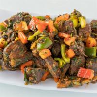 Goat Meat Platter ( Full Portion) · Fried goat meat infused with a variety of west african seasonings and tasty sautéed vegetabl...