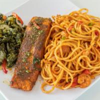 Pasta W/ Salmon & Spinach · Grilled succulent salmon with a side of freshly made tangy jollof pasta and sautéed spinach.