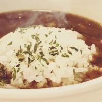 Gumbo · Seafood gumbo loaded with crab meat, shrimp, smoked sausage and okra topped with a bed of ri...