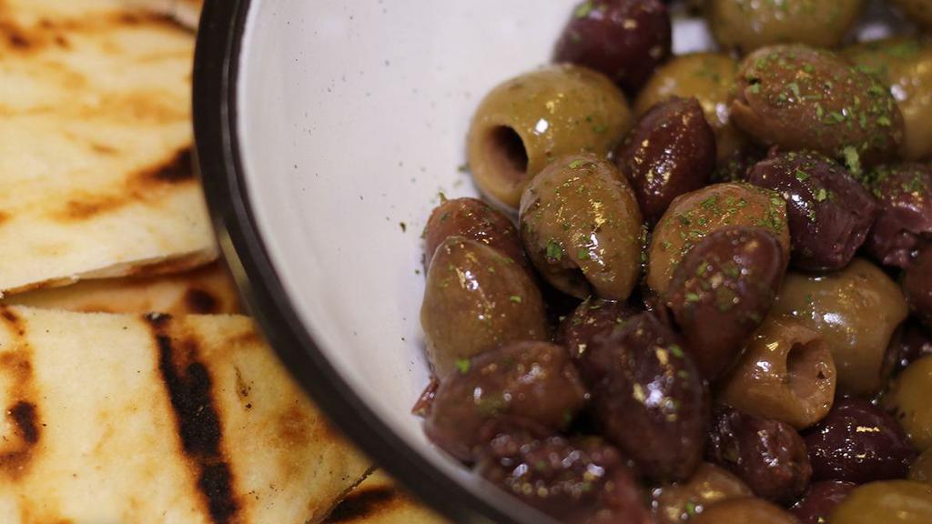 Mixed Olives · Prepared with our house spicy garlic house sauce.