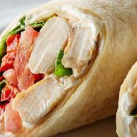 Chicken Wrap · Grilled chicken breast, romaine lettuce, jocoque and scallions wrapped in a pita bread. Incl...