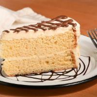 Tres Leches Cake · This light and fluffy tres leches, uses three types of milk and is topped with whipped cream...
