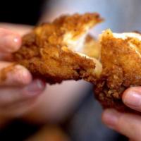 Add A Chicken Tender · One Jumbo Tender with your choice of seasoning.