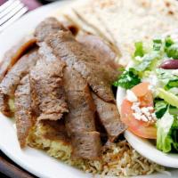 Gyro Plate · Strips of succulent gyro meat, hot off the grill, and bed of rice. Served with the special g...