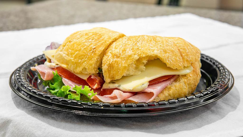 Bistro Ham & Cheese · Ham,  Leaf lettuce, tomato, red onion, herb mayo, mustard, and swiss cheese.