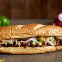 Philly Cheesesteak · Loaded with Philly Meat, Green Peppers, Red Onions, & a mix of Wisconsin Cheese Blend and Ch...