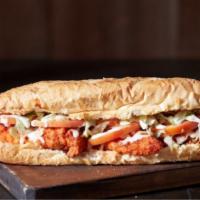 Buffalo Chicken · Breaded Chicken, Hot or Mild Sauce, Tomatoes, Wisconsin Cheese Blend & Ranch Dressing