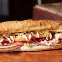 The Club · Ham, turkey, bacon, Wisconsin cheese blend, lettuce, tomatoes, and mayo. 1050 calories.