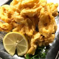 Crispy Calamari · Deep-fried crispy calamari served with spicy mayo sauce