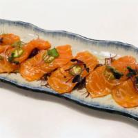 Salmon Carpaccio · Thin slices (5 pcs) of salmon served w/ micogreens, jalapenos, and ponzu sauce