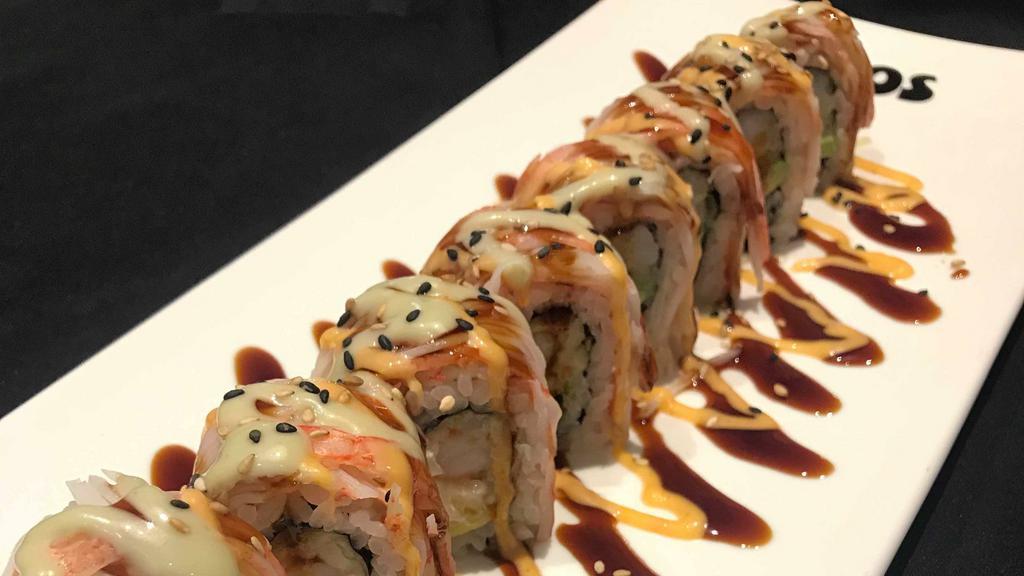 Shaggy Dog (8) · Shrimp tempura, cream cheese, avocado rolled w/ seaweed, rice topped w/ shredded crabsticks; finished w/ spicy mayo, hot sauce, eel sauce & sesame seeds.