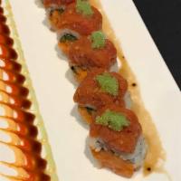 Spicy Lover (8) · Spicy salmon, jalapeno, crunchy wrapped w/ seaweed and rice topped w/ spicy tuna, flying fis...