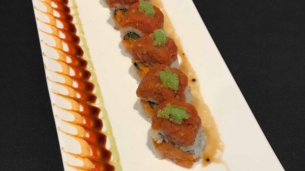 Spicy Lover (8) · Spicy salmon, jalapeno, crunchy wrapped w/ seaweed and rice topped w/ spicy tuna, flying fish roe, spicy sprouts and house special sauce.