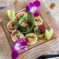 Cherry Blossom (6) · Fresh salmon, tuna, yellowtail, avocado, spicy sprouts & jalapeno rolled in a thin cucumber ...