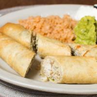 Flautas · Wafer-thin, toasted, rolled tacos served with guacamole and sour cream served three to an or...