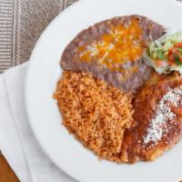 Chile Relleno · Mexican chile pepper, filled with spicy meat, rolled in egg batter and lightly fried served ...