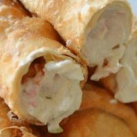 Cheese Rolls    · Cream cheese, carrot, herbs and spices in spring rolls.