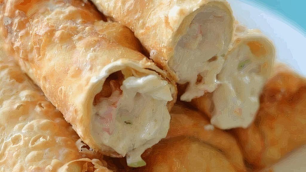 Cheese Rolls    · Cream cheese, carrot, herbs and spices in spring rolls.