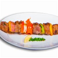 Beef Filet Kabob Plate · Served with rice, 2 oz tahini sauce, and pita bread.