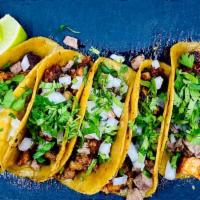 Mini Campechanos · Five tacos of vaquero mix of meats: bistec, pastor, chorizo, onions, cilantro, served with l...