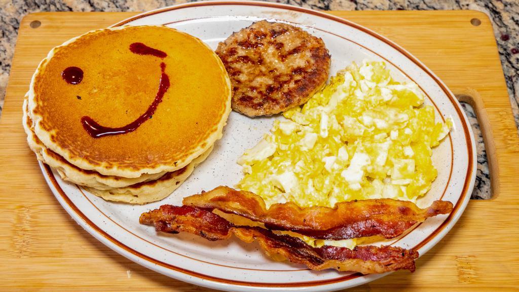 3 Pancakes With Eggs · 3 Pancakes eggs sausage or bacon.