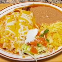 Fajita Enchiladas · Two beef fajita enchiladas rice, beans, pico de gallo and cream.